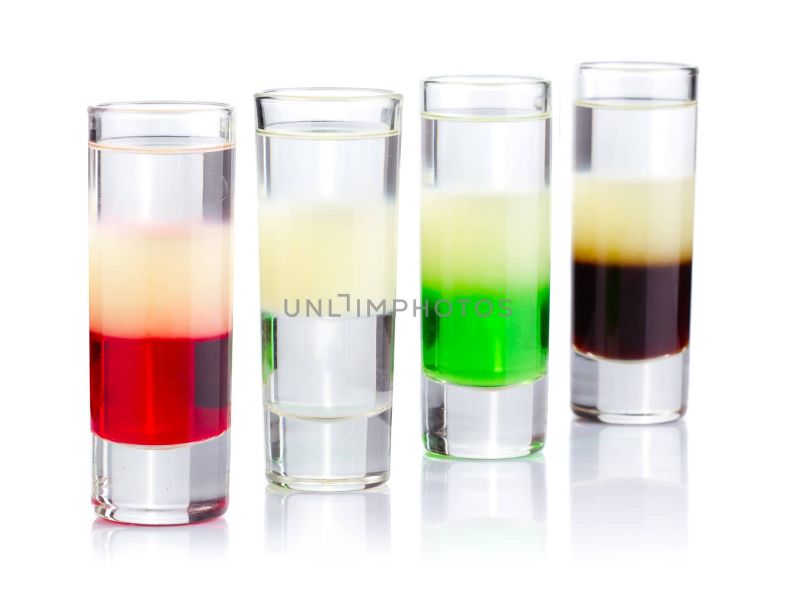 Four shot drink cocktails isolated on white background