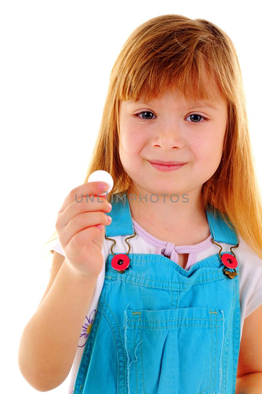 Small beauty girl with one big white tablet on white background
