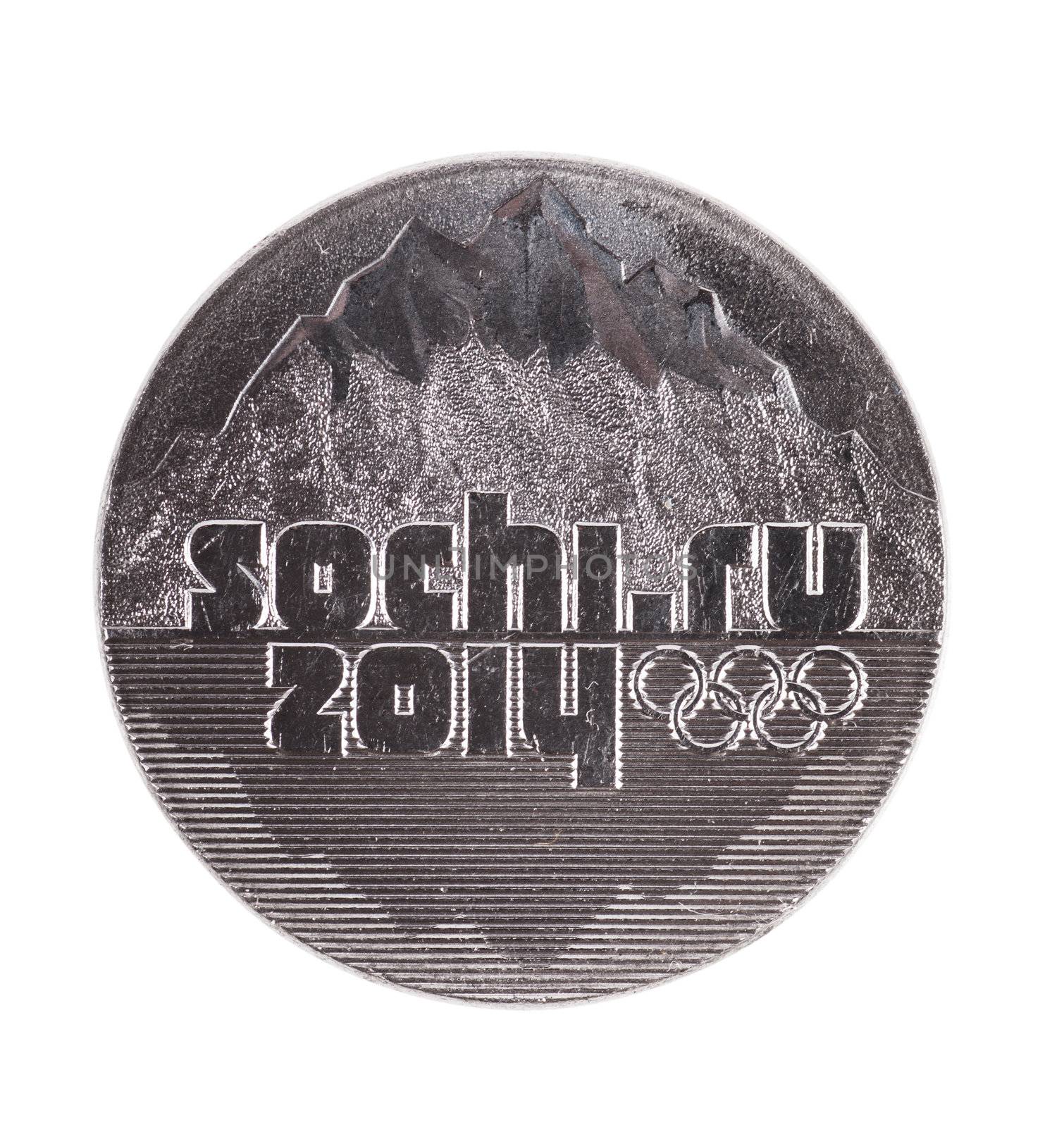 Coin with Sochi 2014 inscription over white background