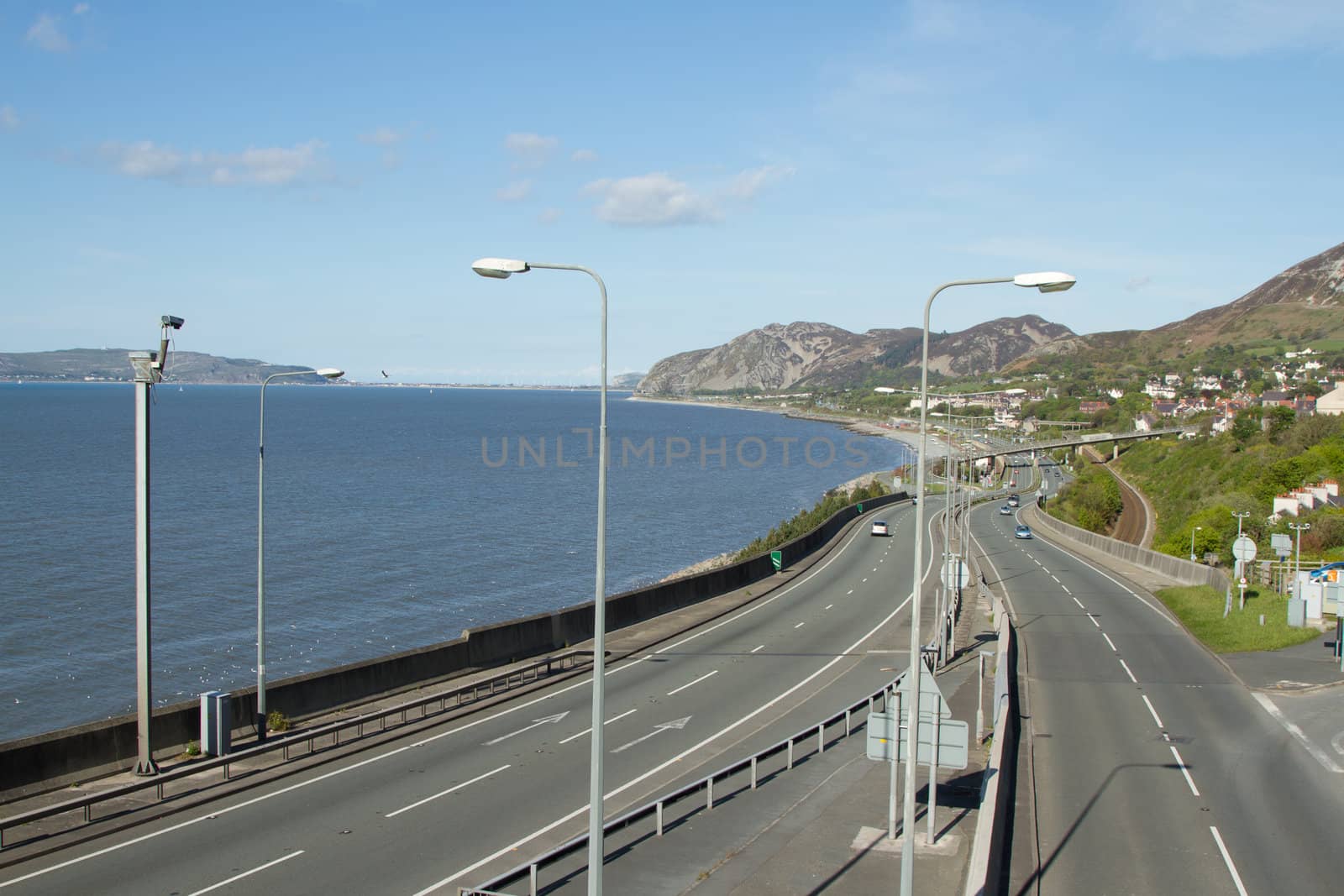 The A55 at Penmaenmawr, North Wales, UK, looking towards Llandudno and the Great Orme.