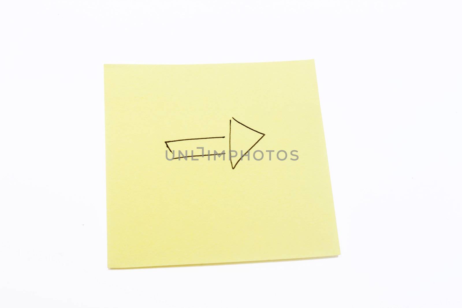 Arrow on a yellow sticky note isolated on white