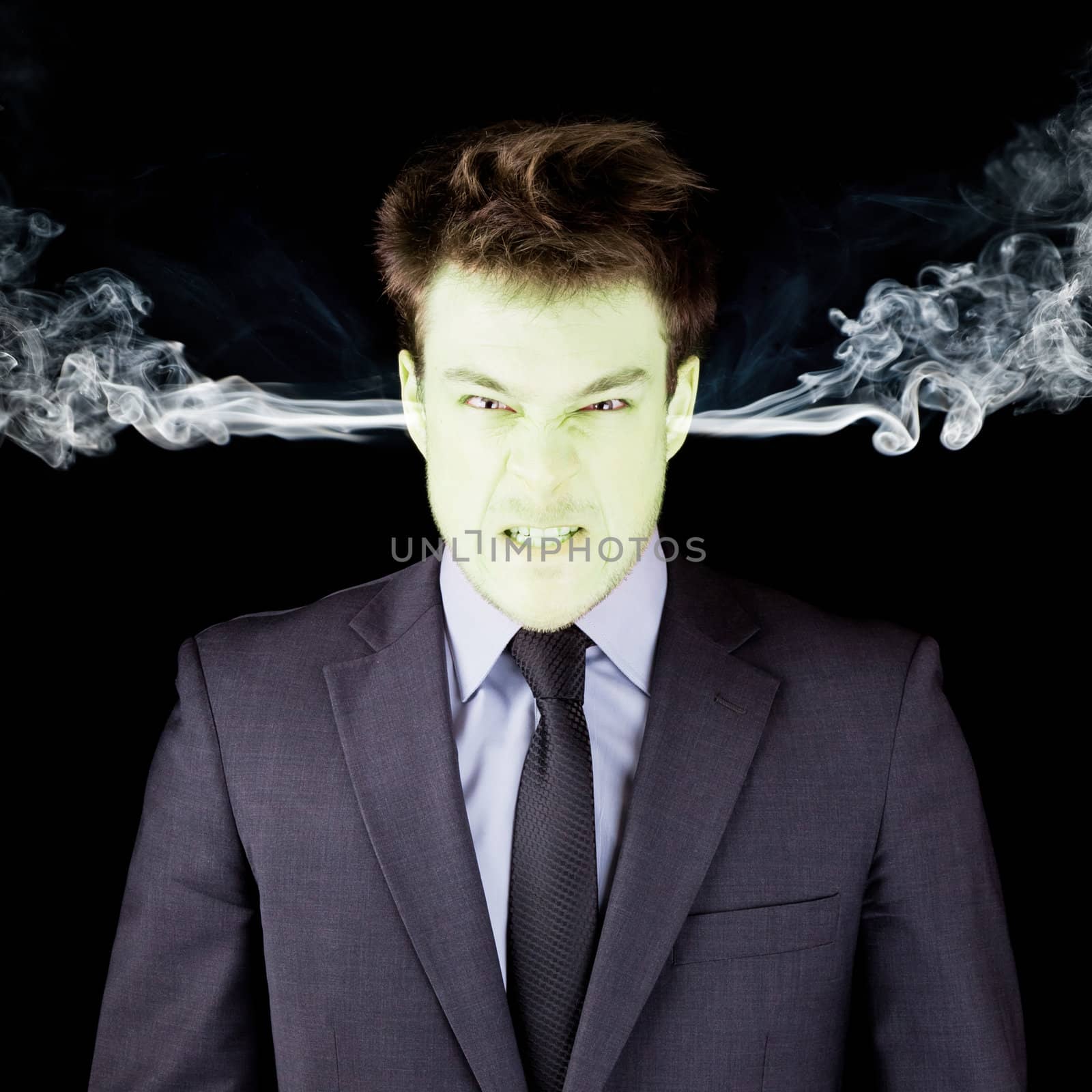 Furious businessman getting green face by aetb