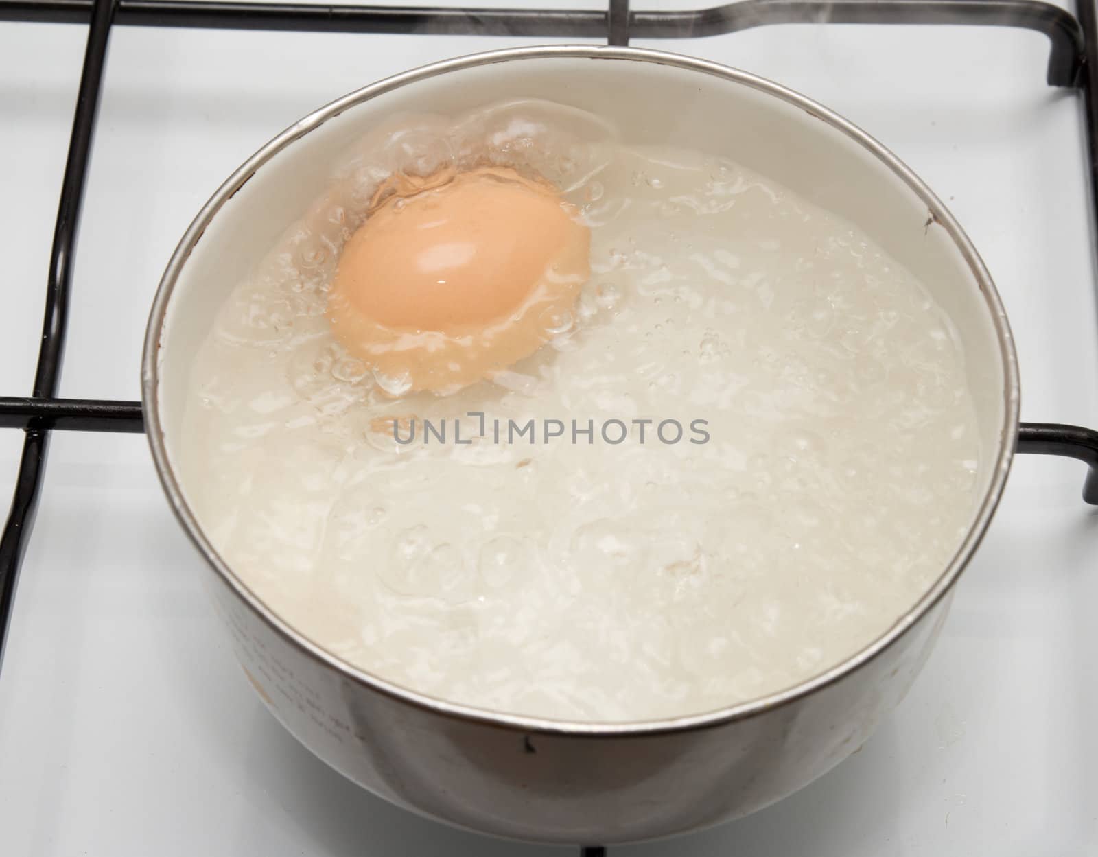 the egg is cooked in a pan