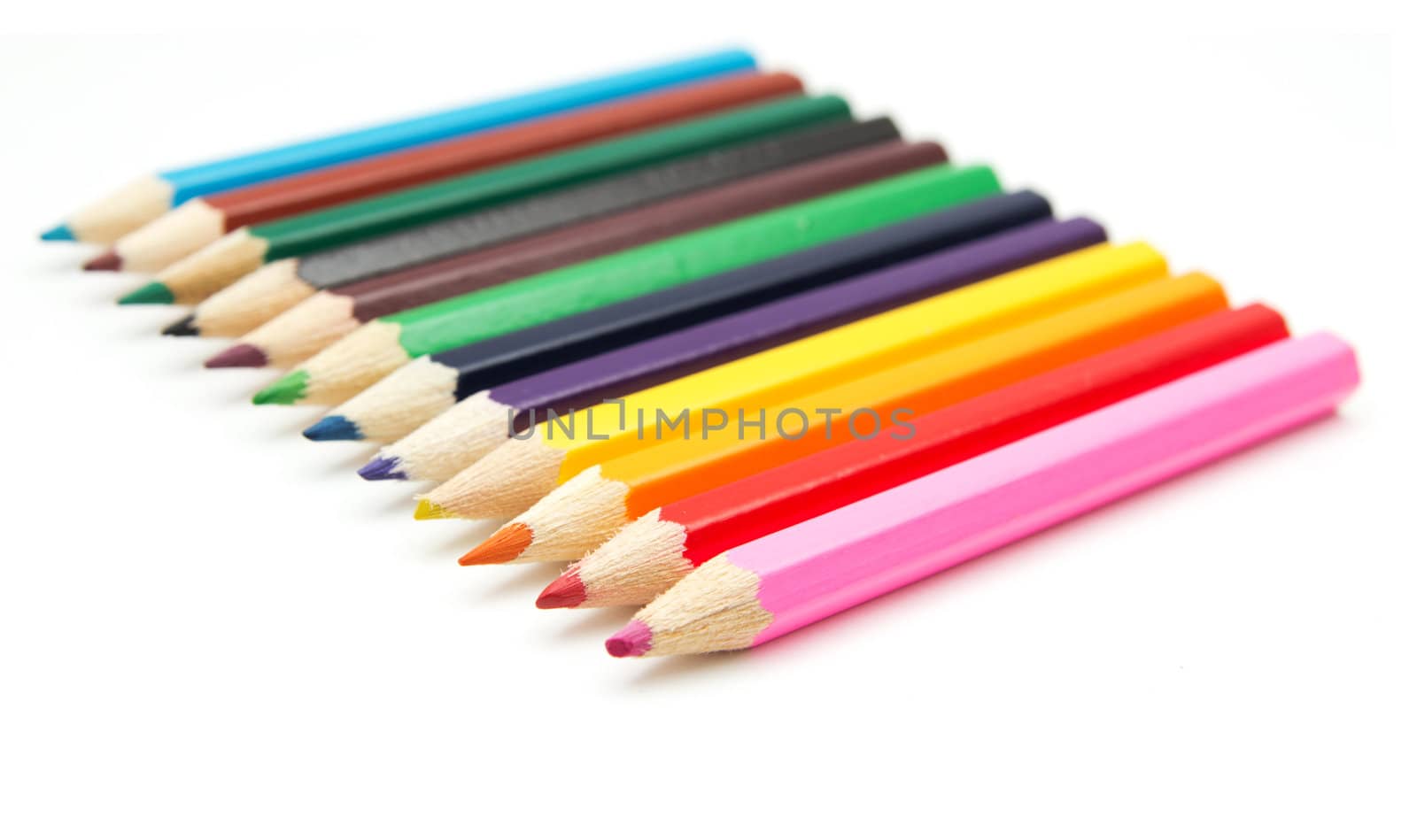 Colour pencils isolated on white background close up  by schankz