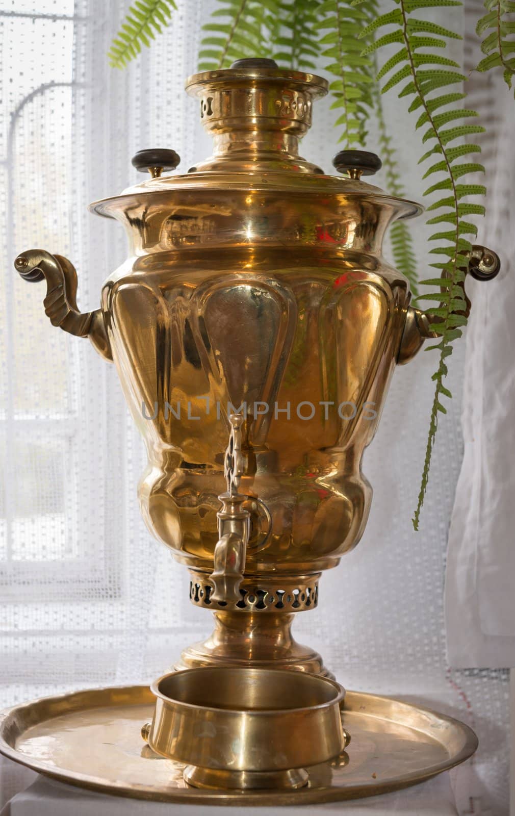 Traditional russian old samovar with selective focus on the body