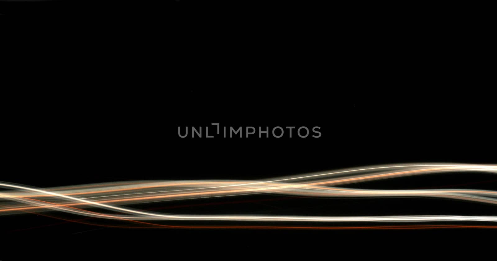 Abstract white and orange lines on a black background.
