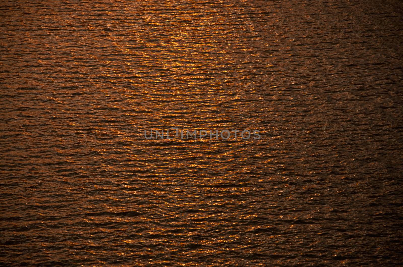 ripples in gold water by Yuri2012