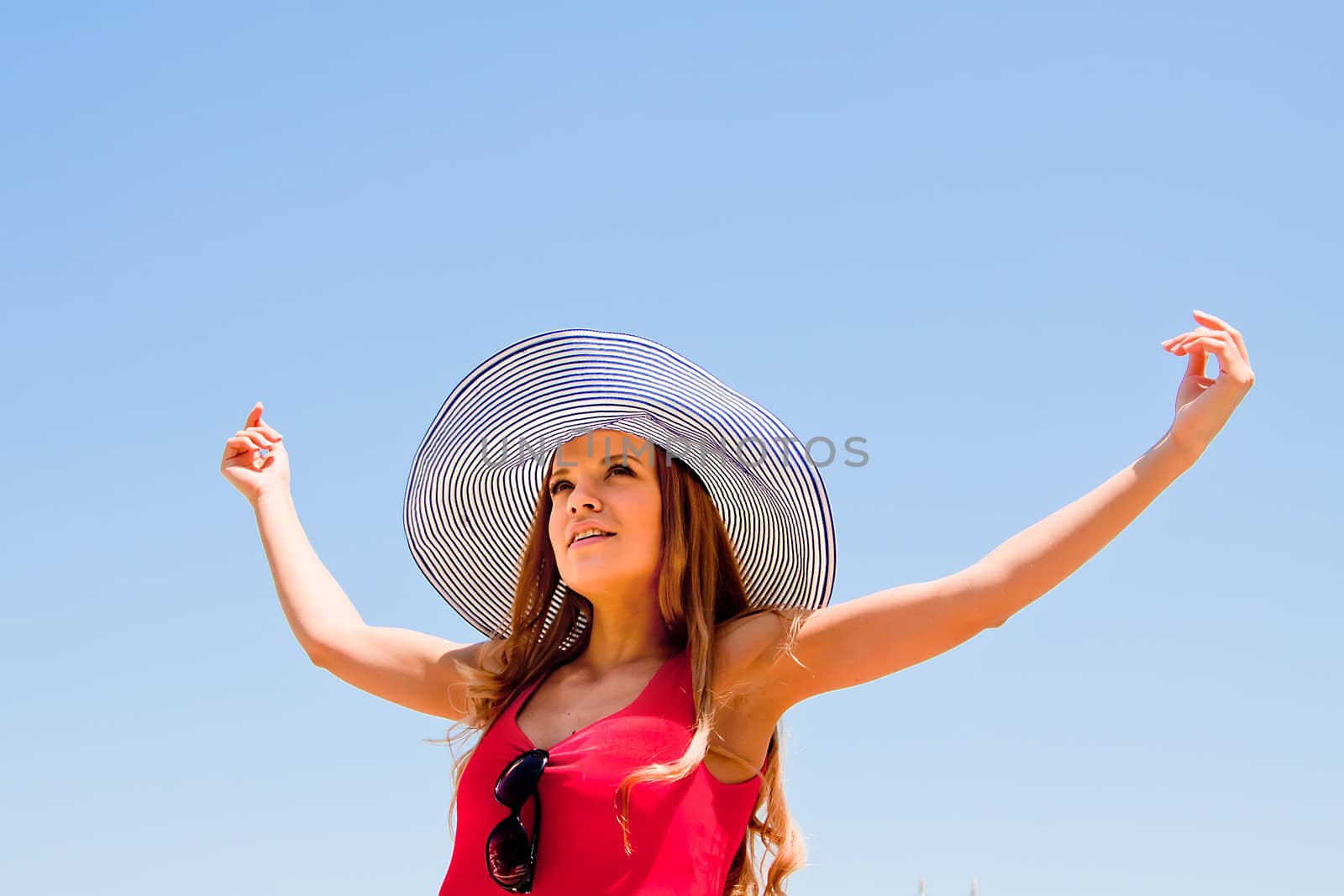 happy young beautiful girl  in the sky