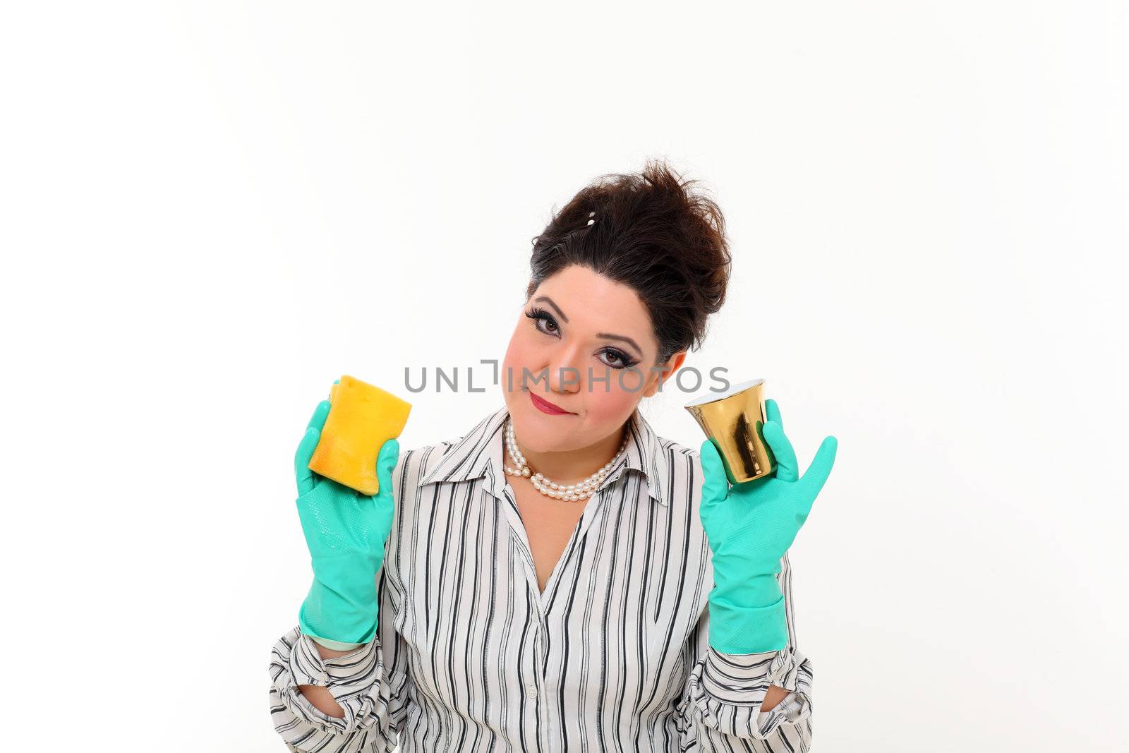 Woman in carrier cleaning a gold mug
