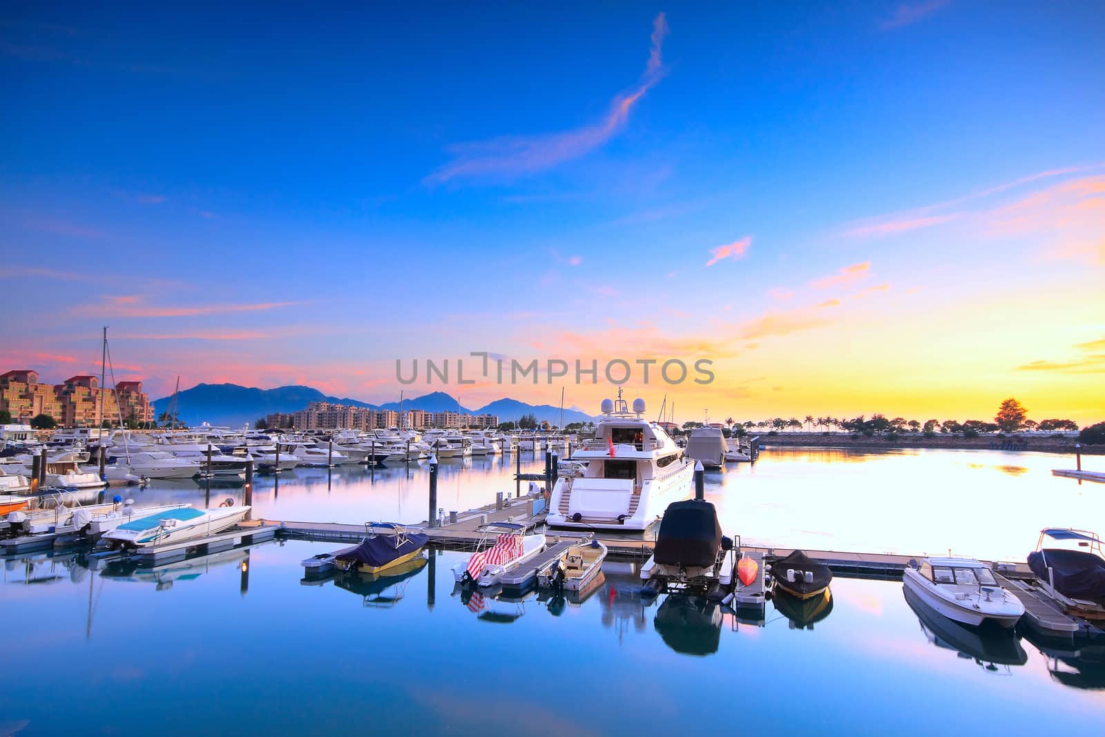 yachts in the golden coast sunset ,in hongkong 