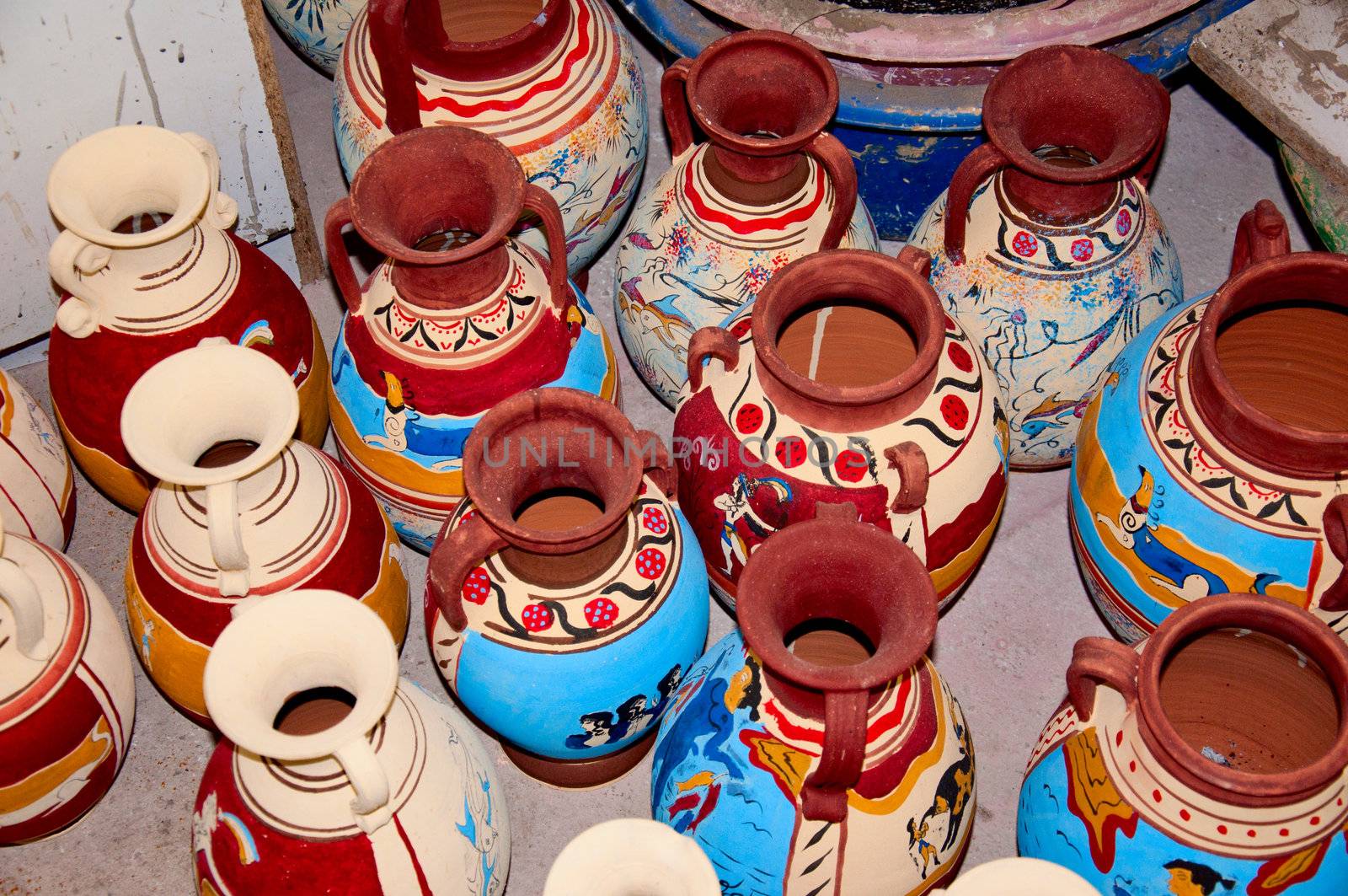 Colorful clay jars in the art  studio