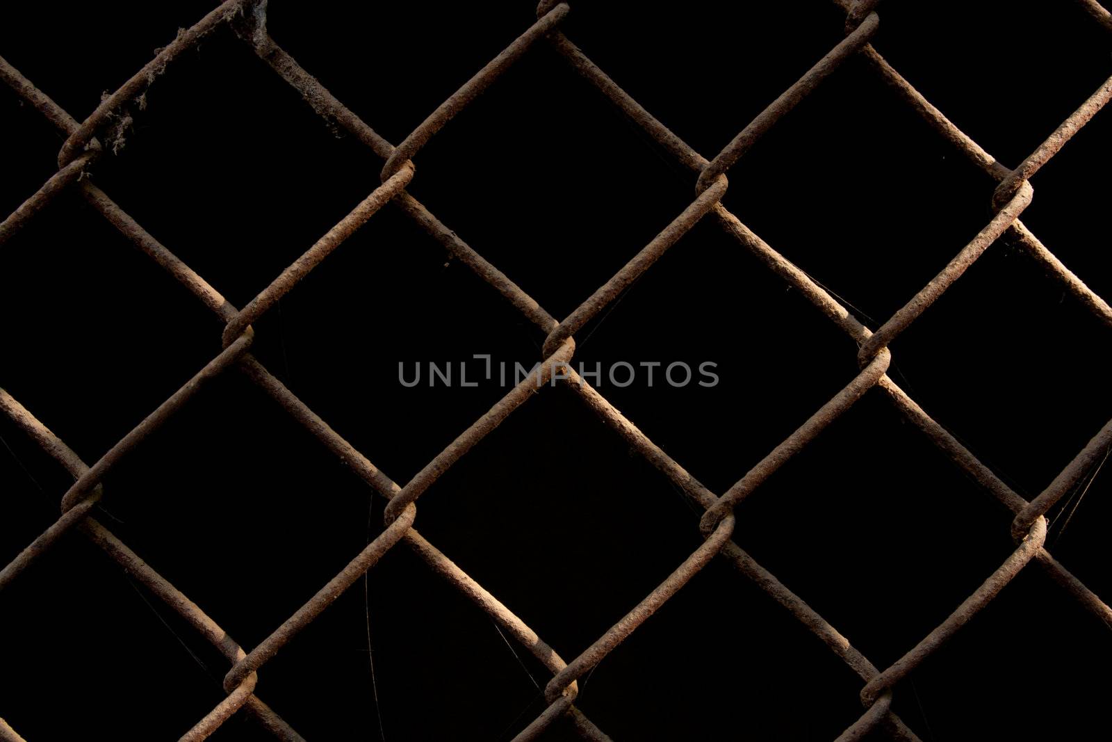 rusty metal grid on a black background