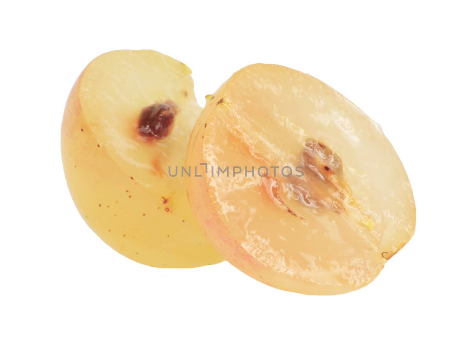 Translucent slice of red grape fruit, macro isolated on white 
