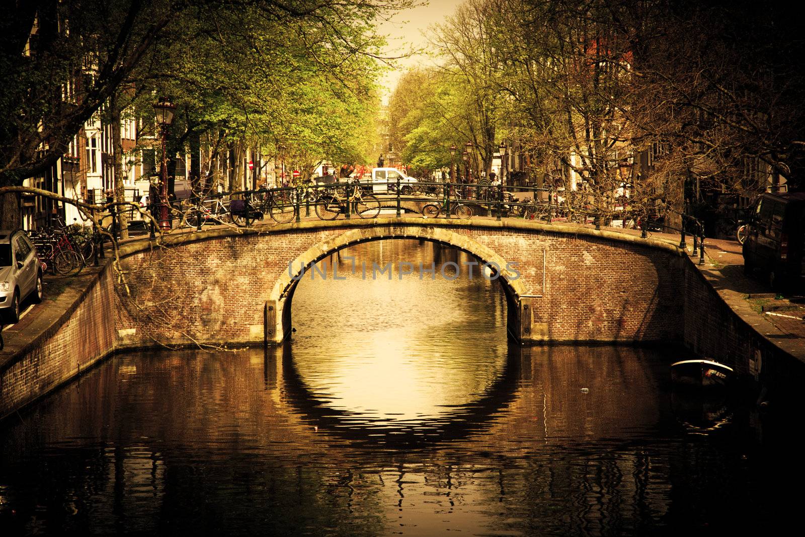 Amsterdam, Holland, Netherlands. Romantic bridge over canal. Old town