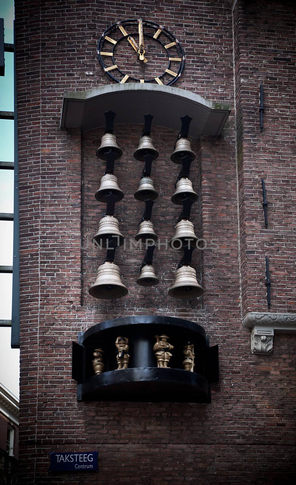 Amsterdam old town bells clock by photocreo