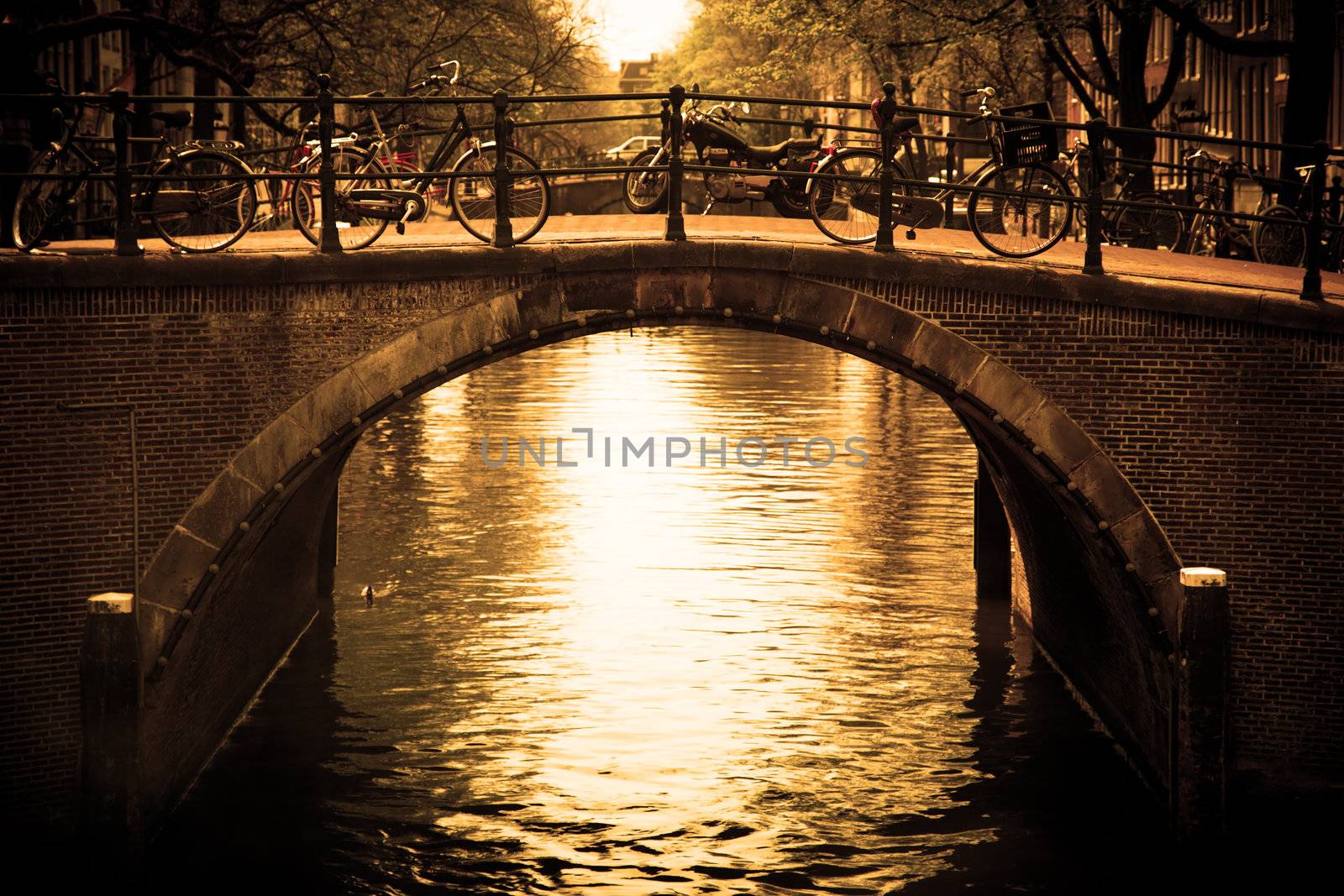 Amsterdam, Holland, Netherlands. Romantic bridge over canal. Old town