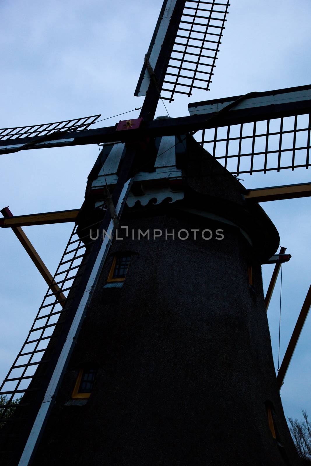 Windmill at dusk in Holland, Netherlands