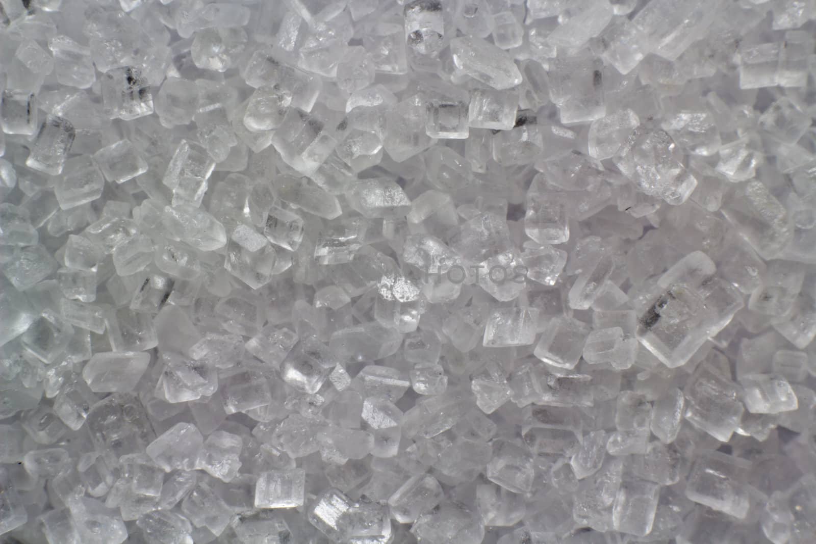 A macro picture of a bunch of white sugar