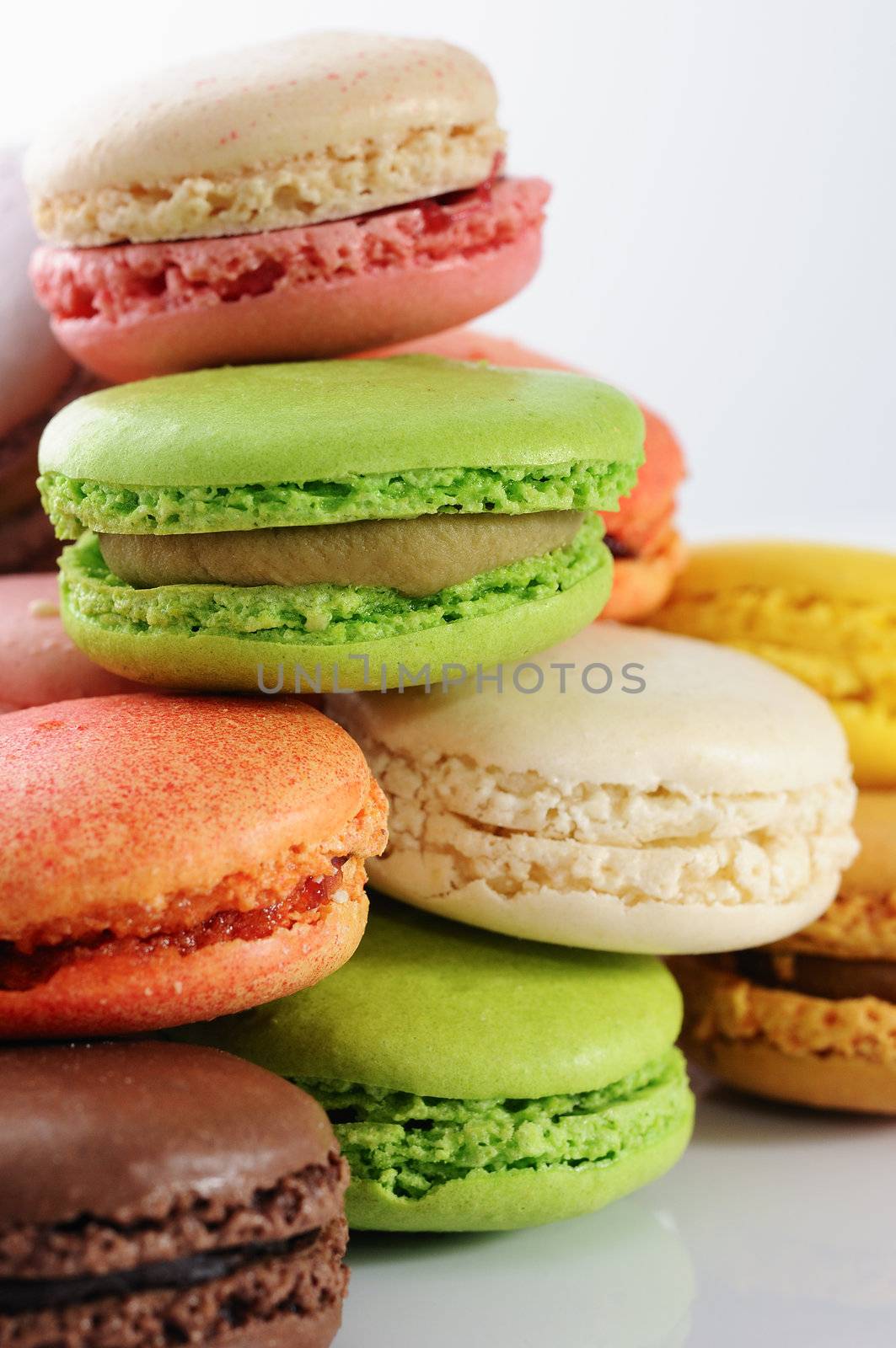 Colorful macaroons on white background 