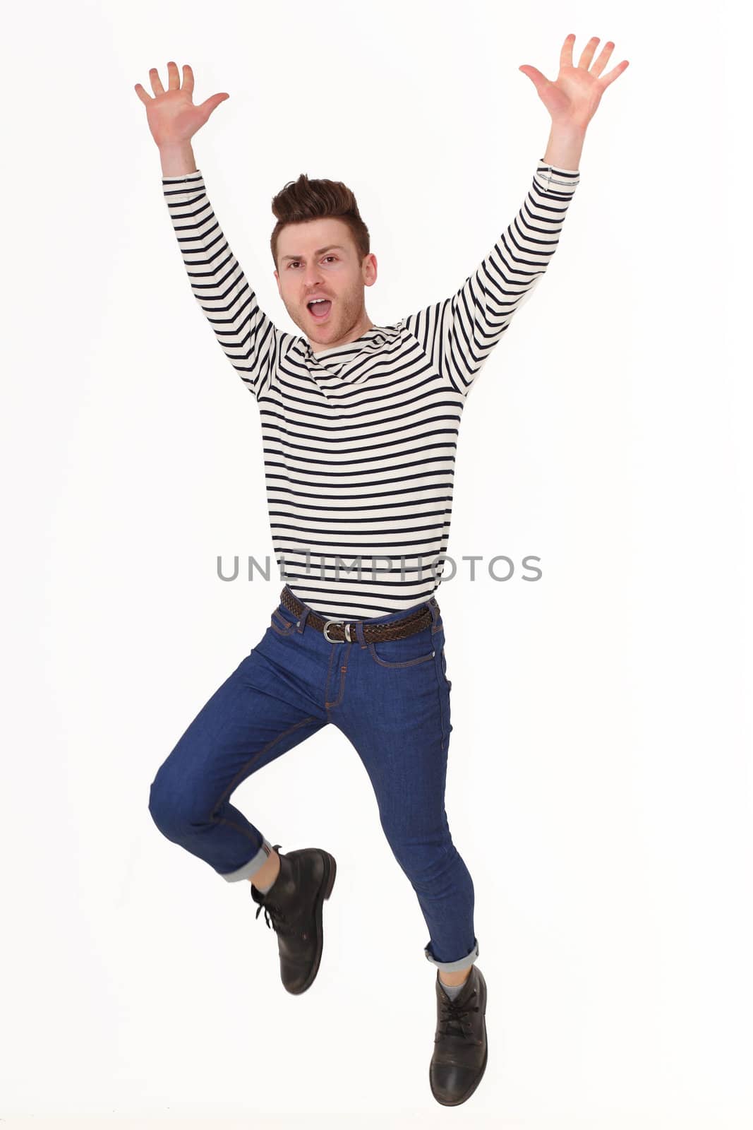 Jumping young man isolated on white backgroung