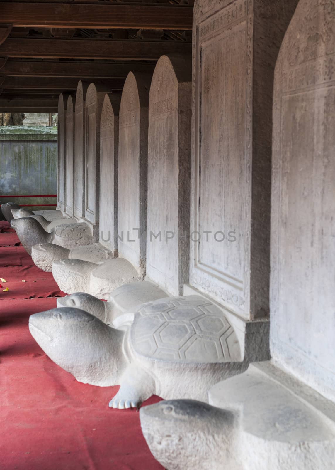 Hall with stelae built on turtles in Temple of Literature. by Claudine