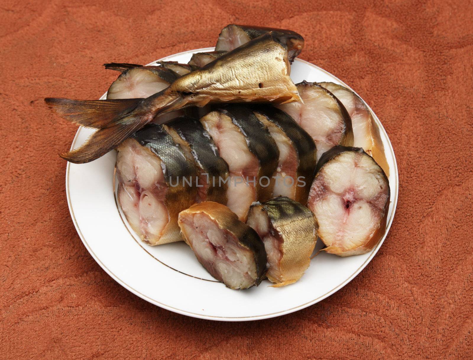 sliced ​​smoked mackerel on a plate