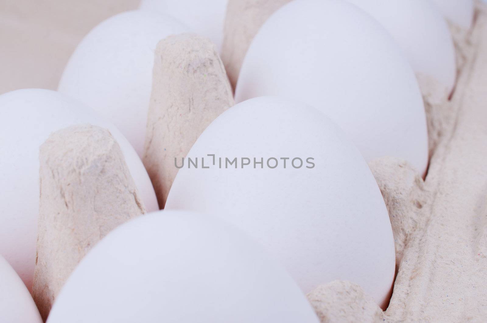 White eggs close up by Nanisimova