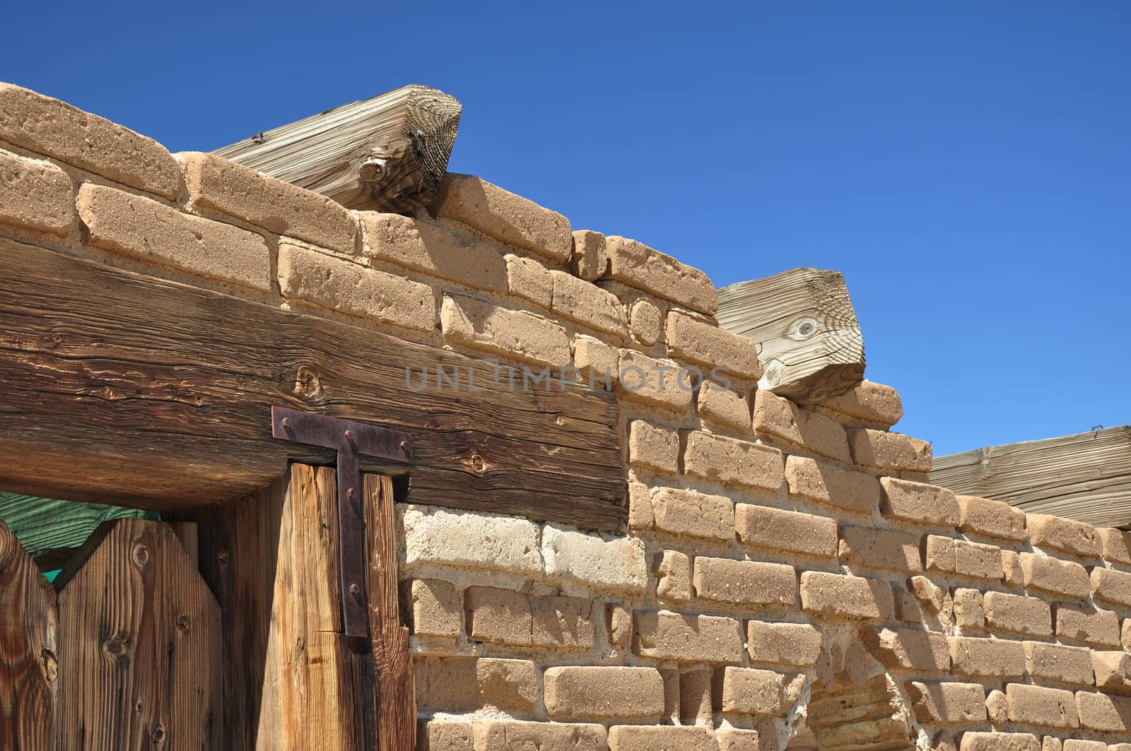 Close up view of an old adobe wall in Pioneertown, California.