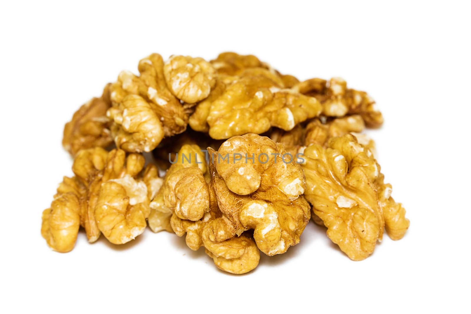 handful of walnuts on white background isolation