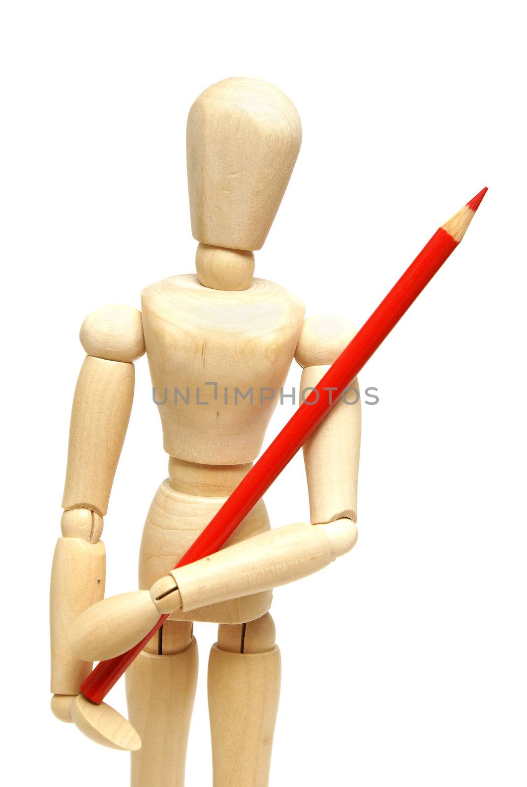 A wood mannequin holds a red pencil crayon for the artist.