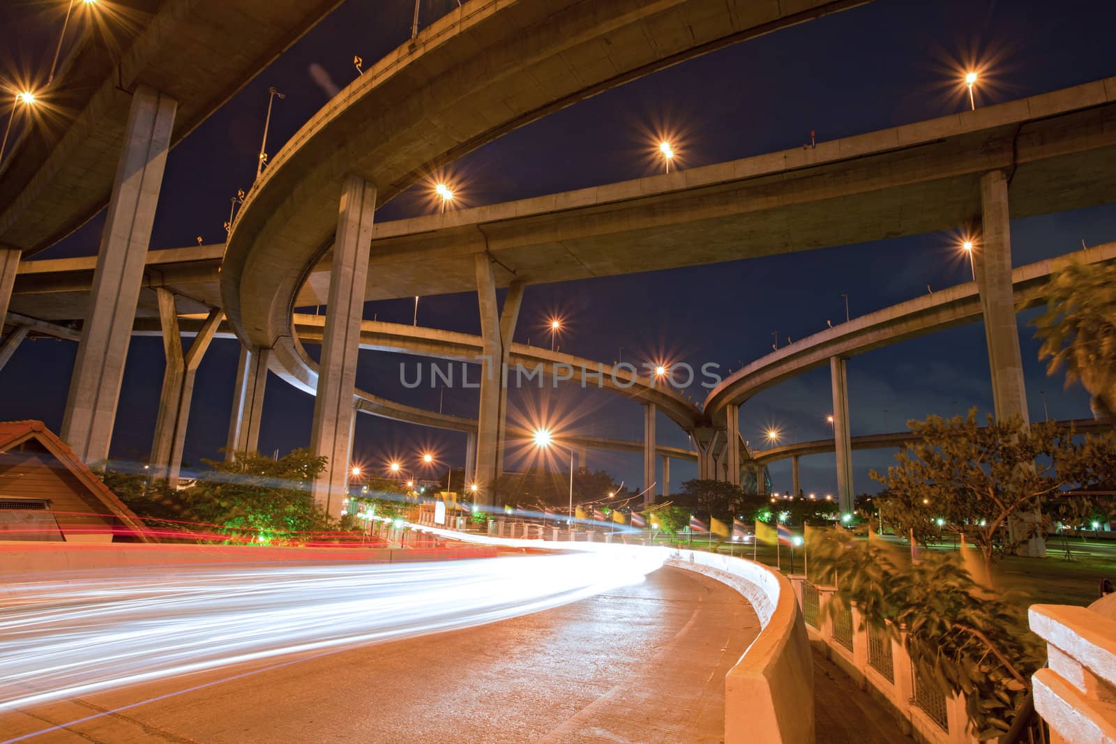Architecture of Mega Bhumibol Industrial Ring Bridge at dusk in Thailand.