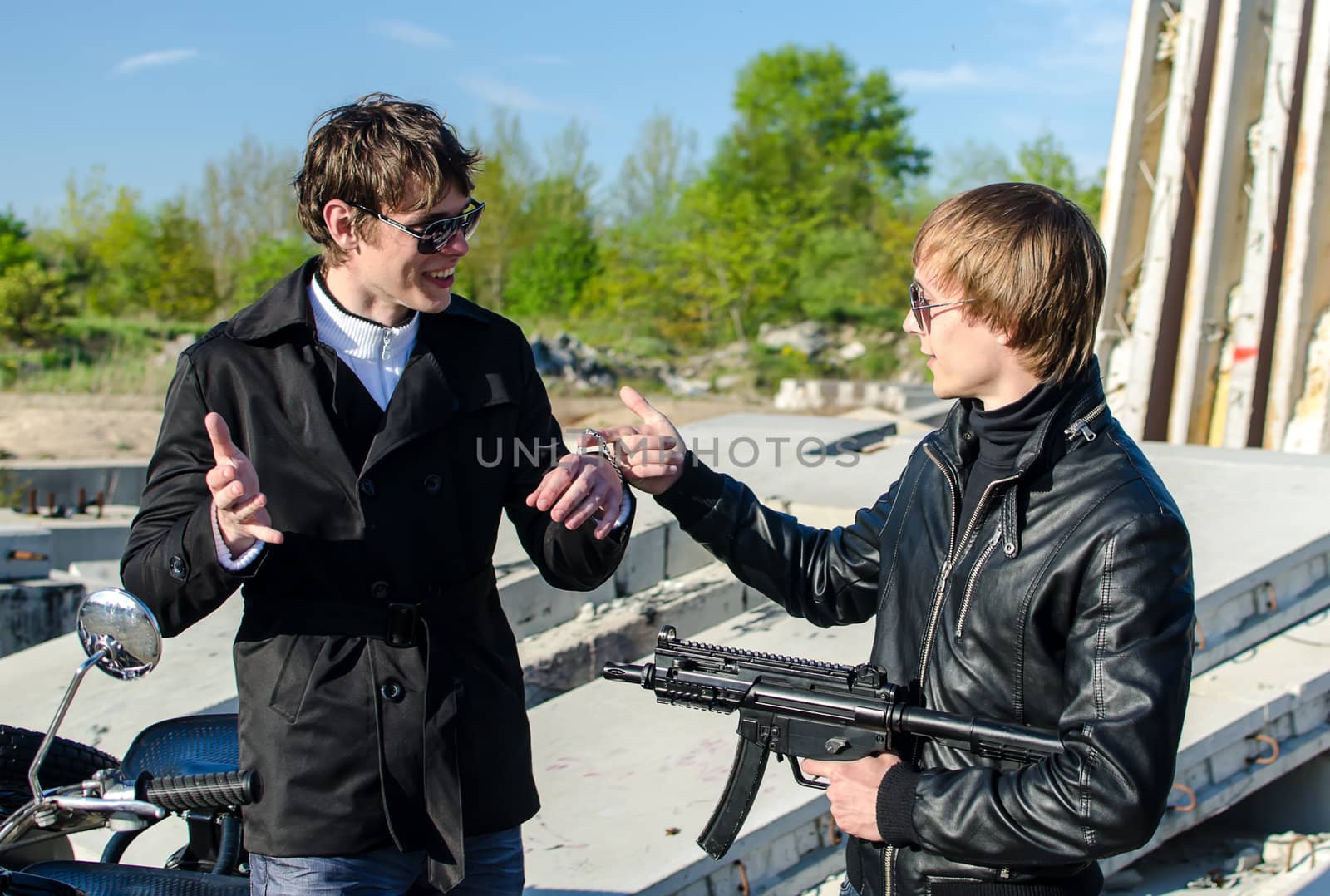 Conversation between two thugs in an abandoned construction site