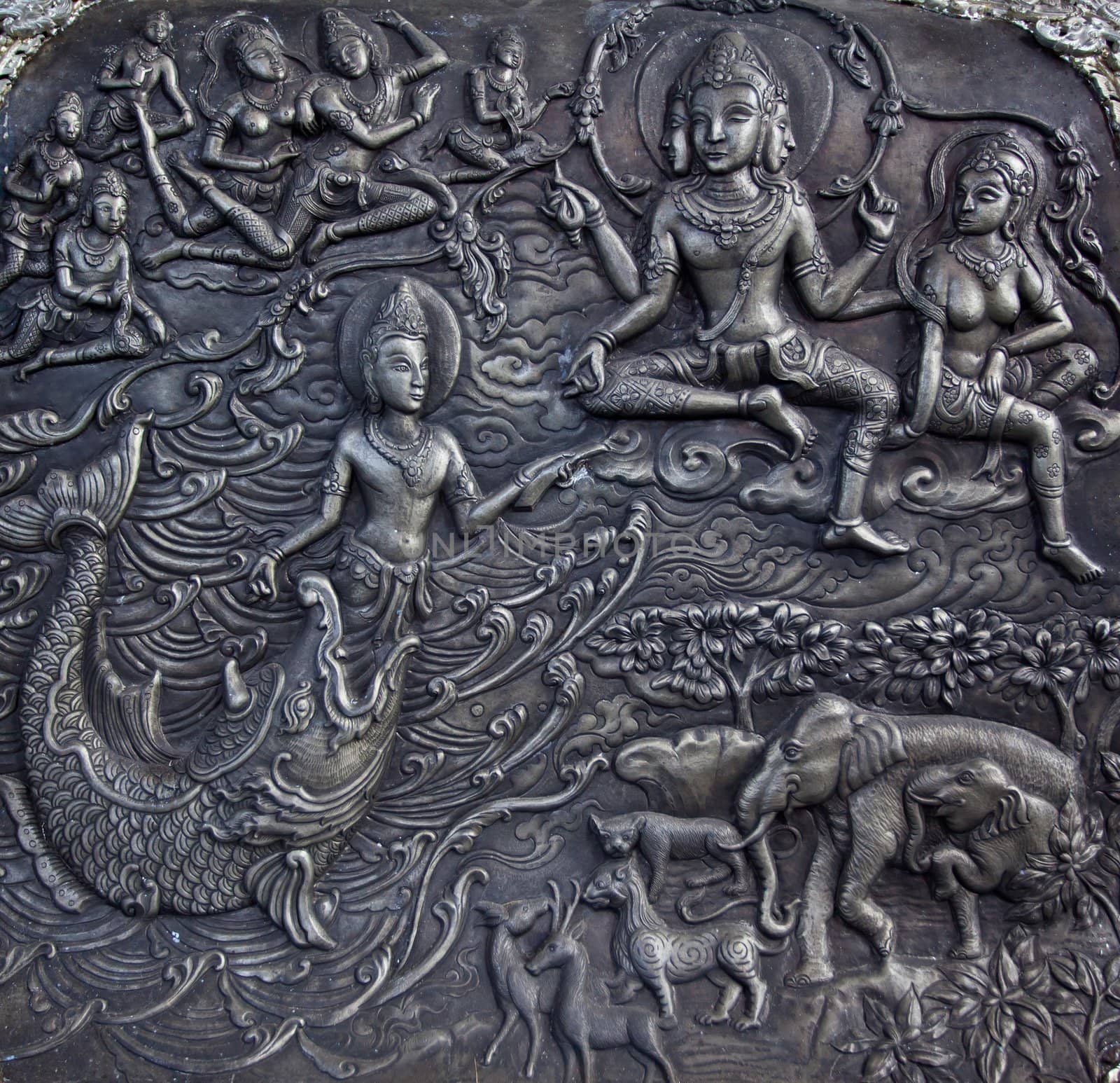 Carved stone at erawan museum,Thailand