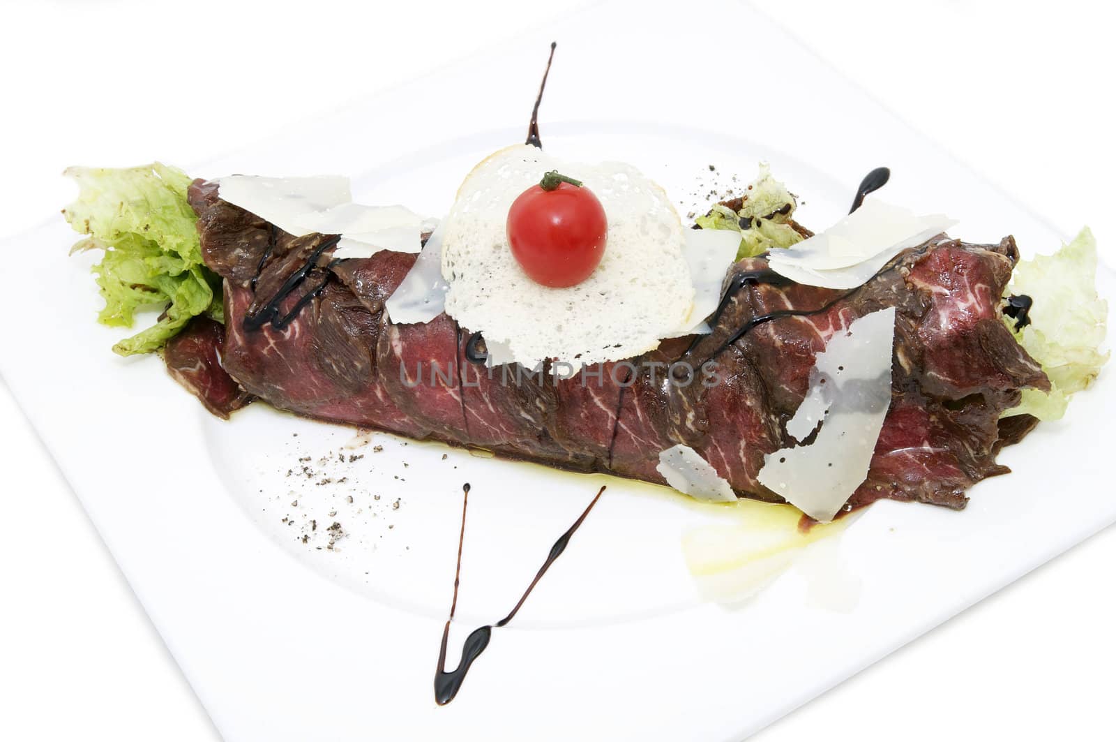 carpaccio with herbs and cheese on white background