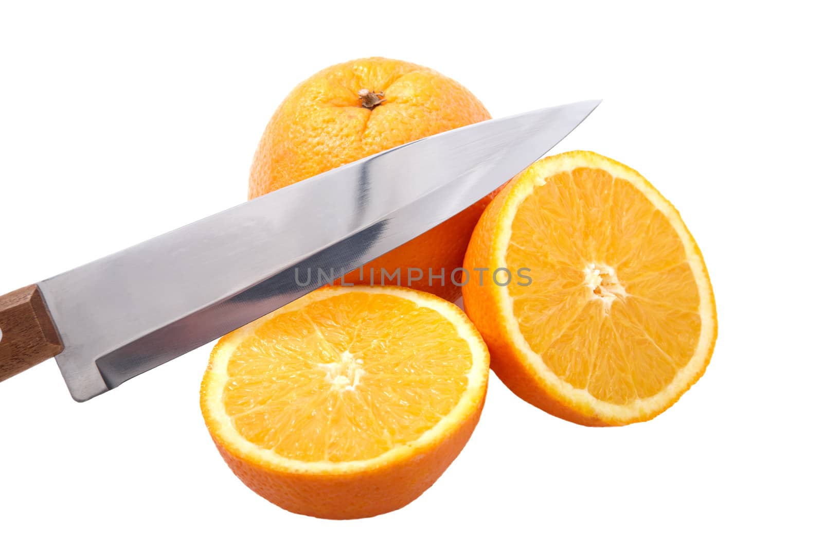Knife and orange cut half-and-half on a white background