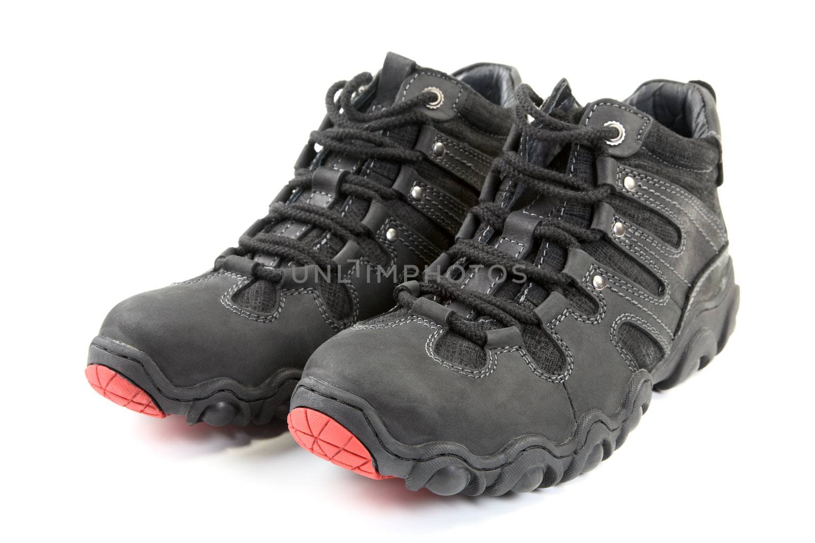 Pair of man's sports boots isolated on a white background