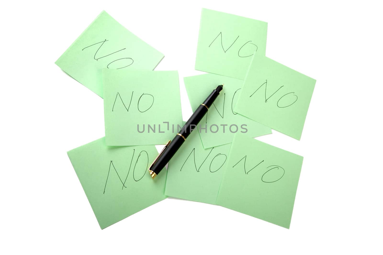 Pen and sticky note on a white background