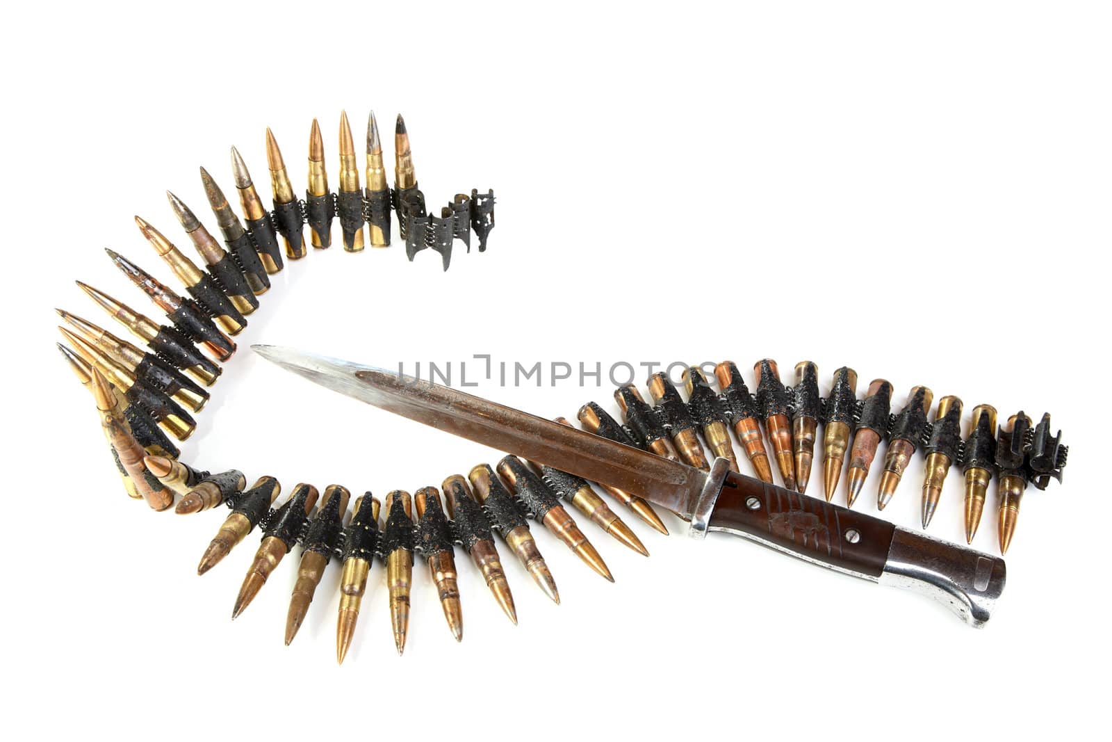 Machine-gun tape and bayonet-knife on a white background