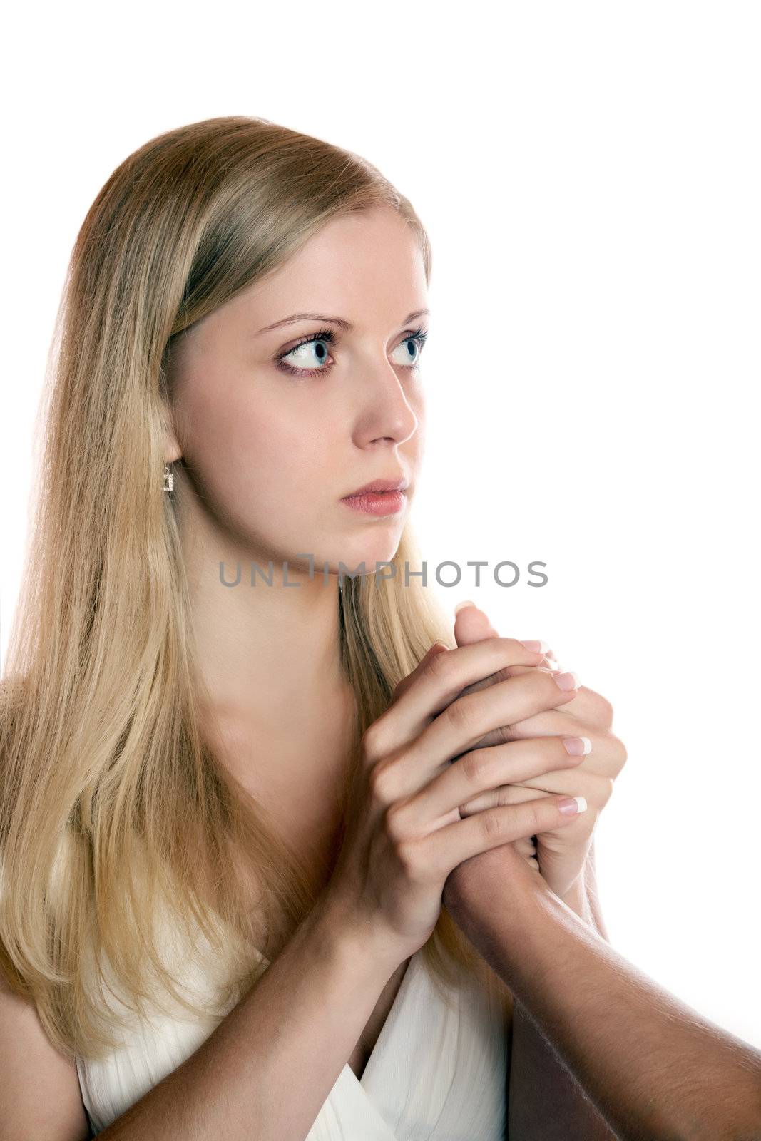 The girl holds two hands a man's hand on  white background