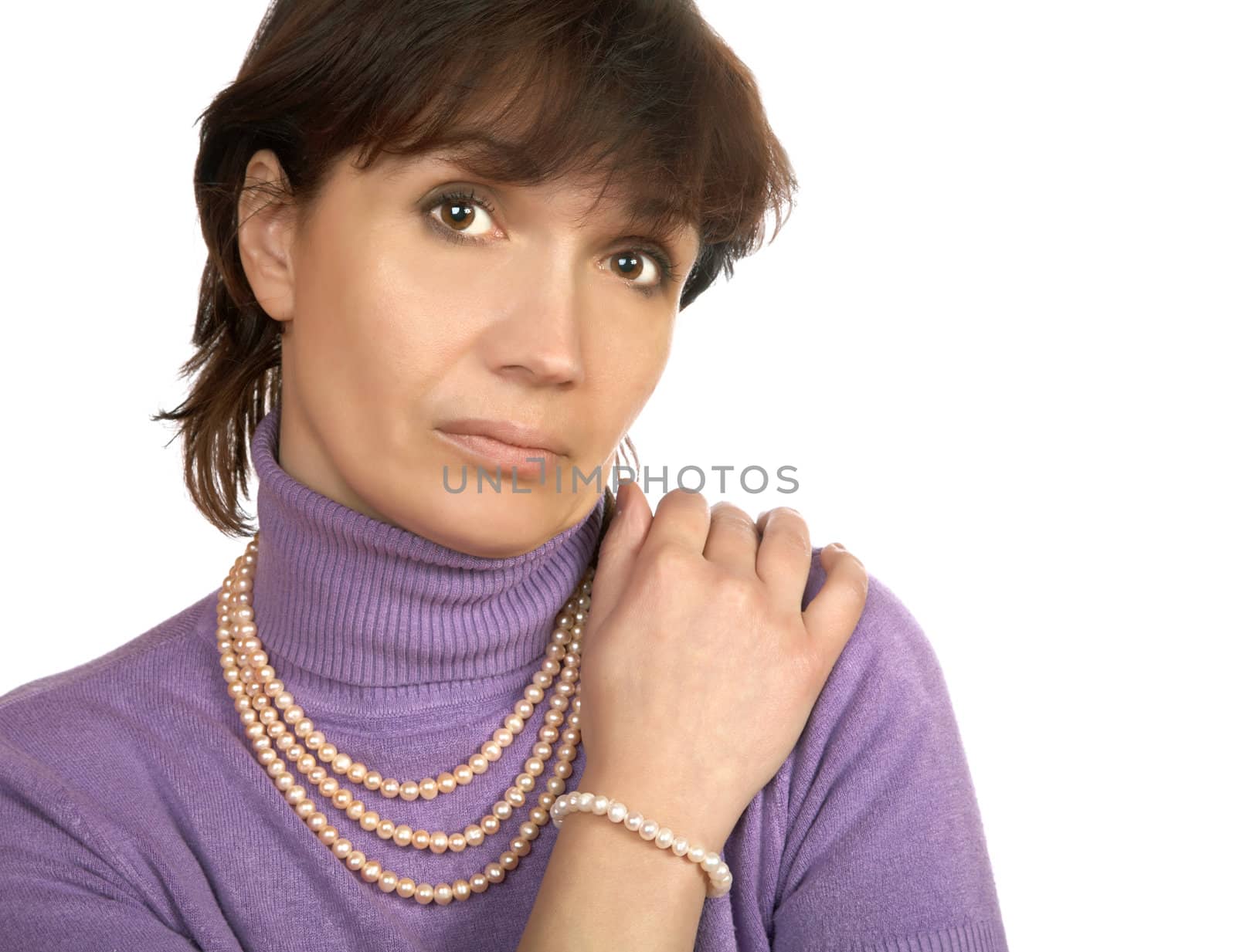 Portrait of the woman with adornment on a white background