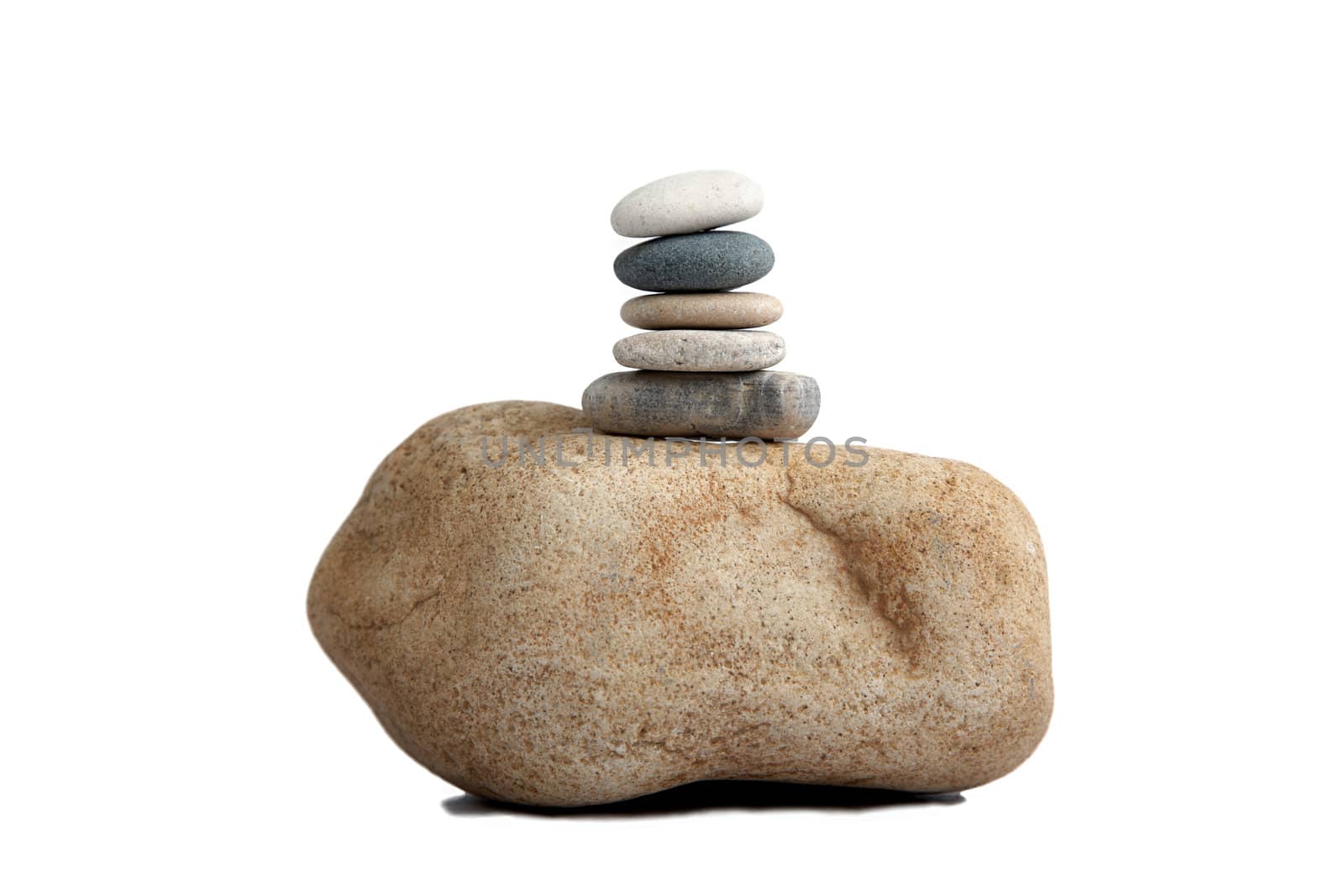 Stack of spa pebbles against blurred background