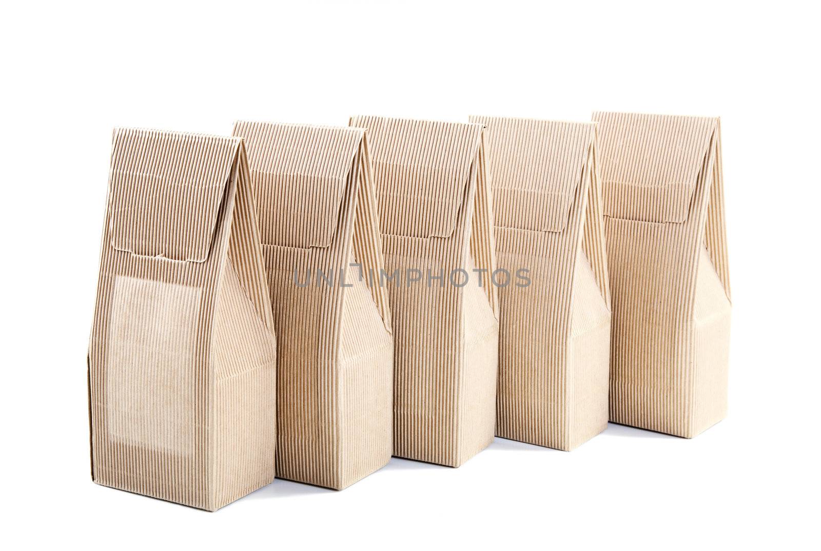 row of boxes from the goffered cardboard isolated on a white background