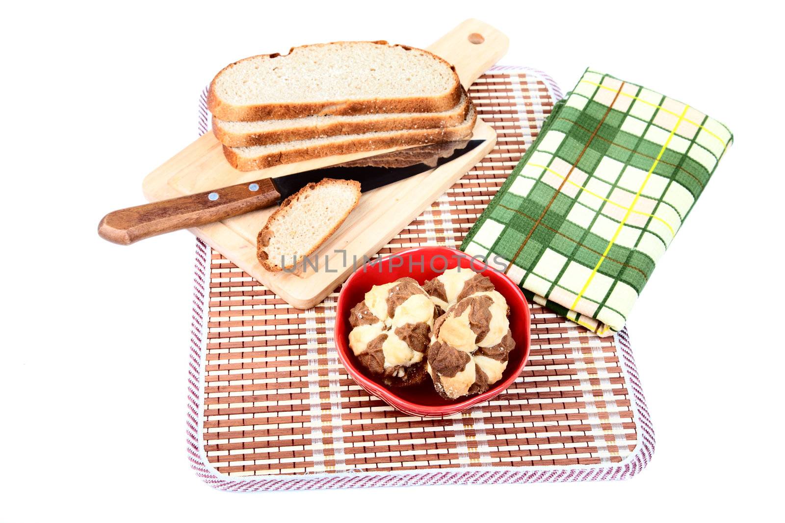fresh bread chip cookies and a towel on  white background