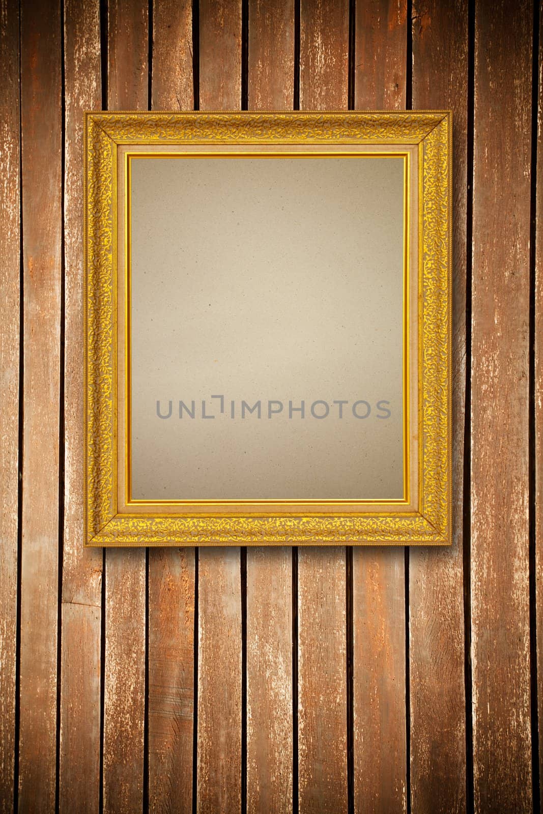Gold frame on wood wall background