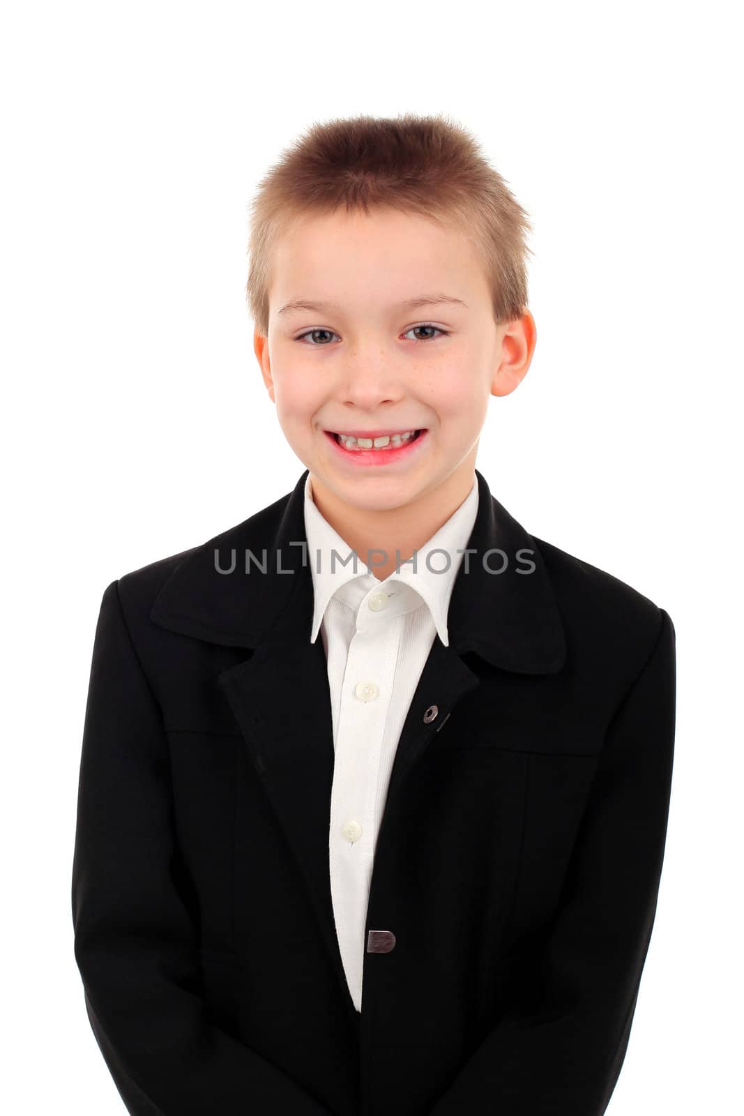 schoolboy smiling on the white background