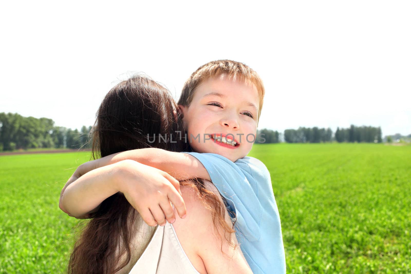 brother and sister in the summer field