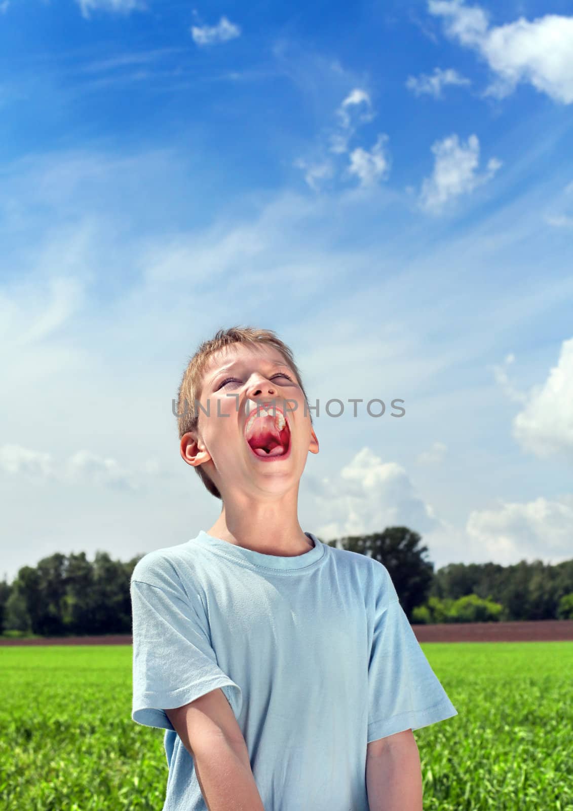 portrait of screaming boy outdoor