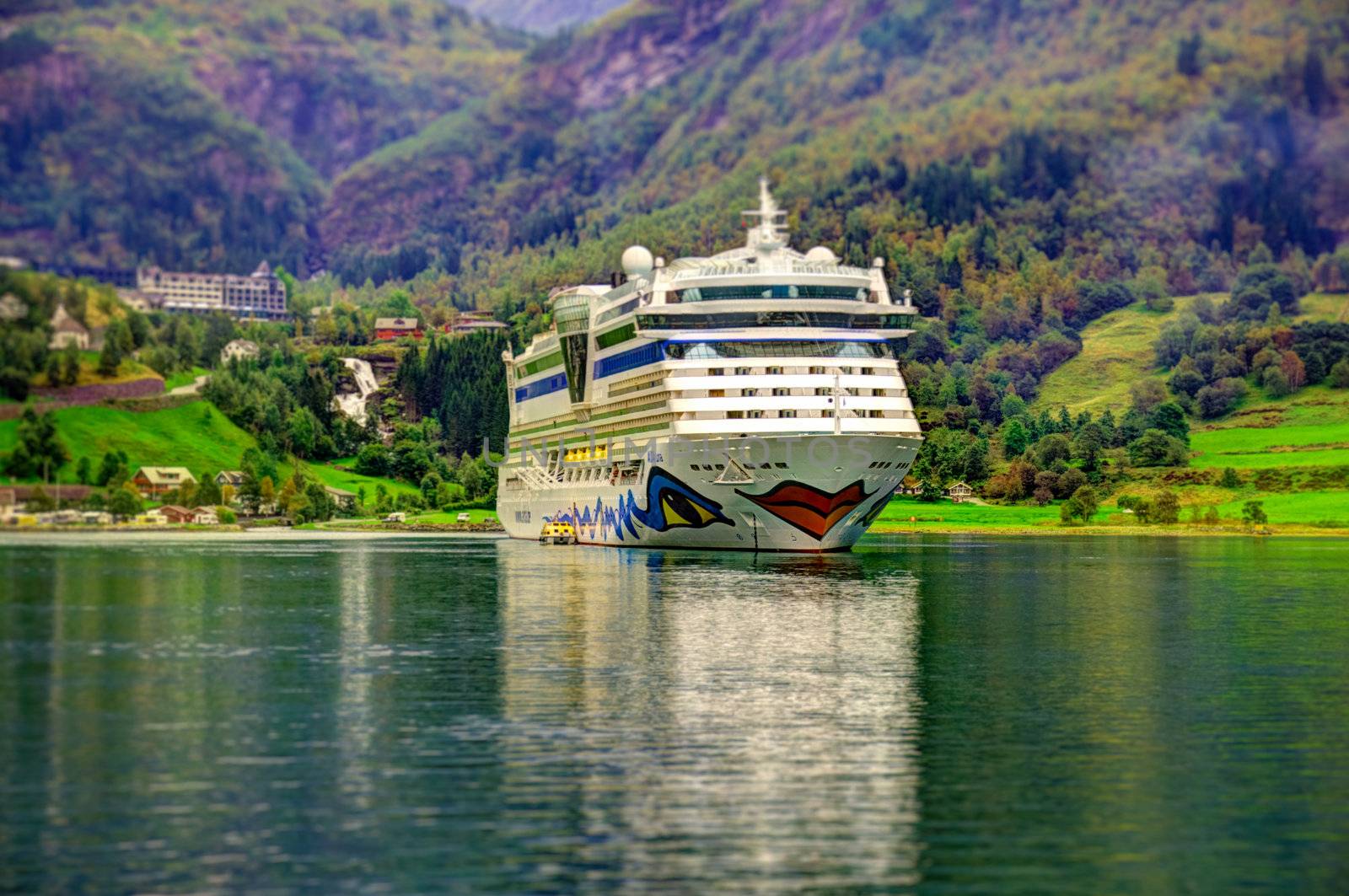 Cruise ship in Geiranger fjord HDR tilt shift