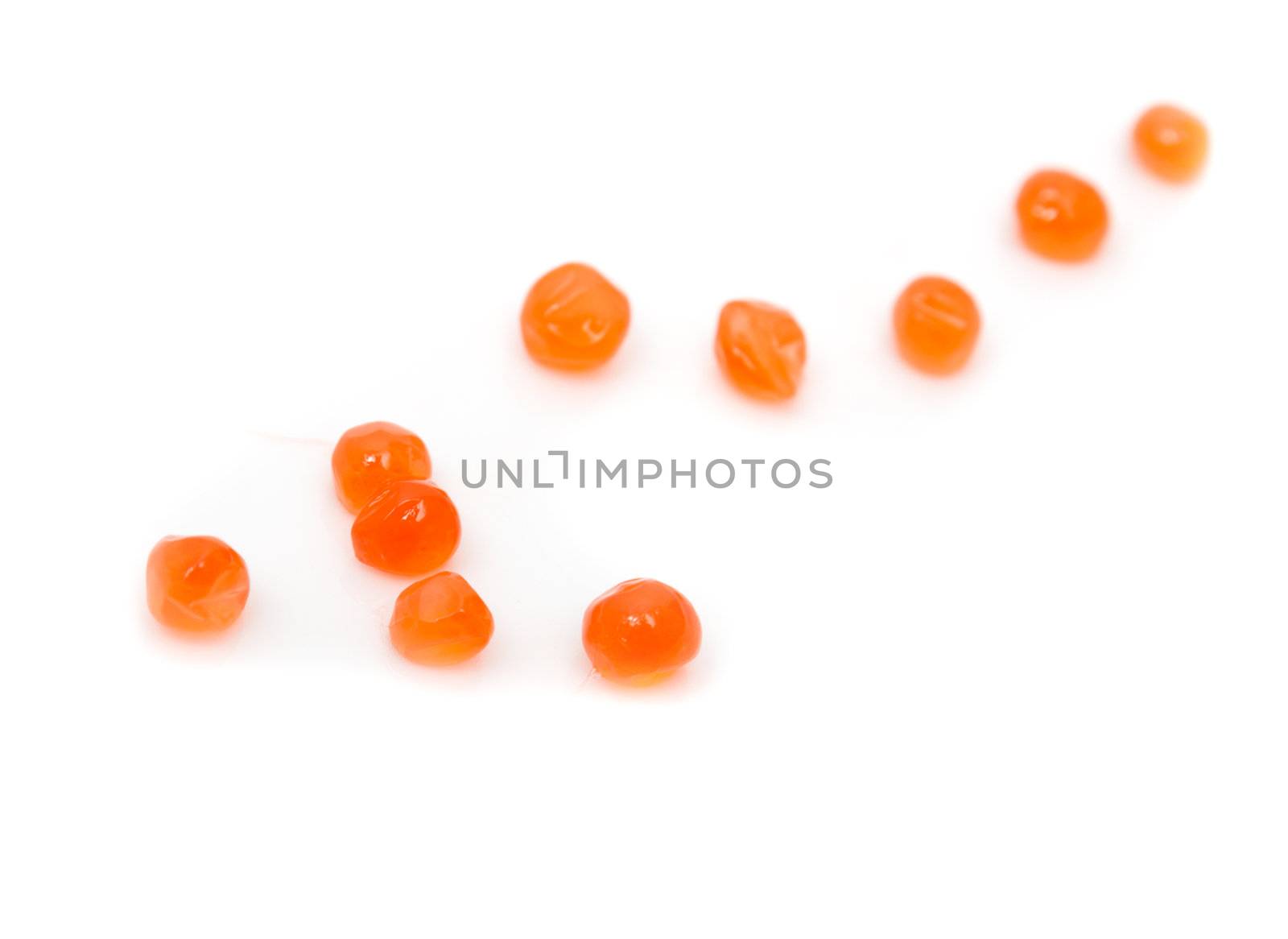 red caviar on white background. macro