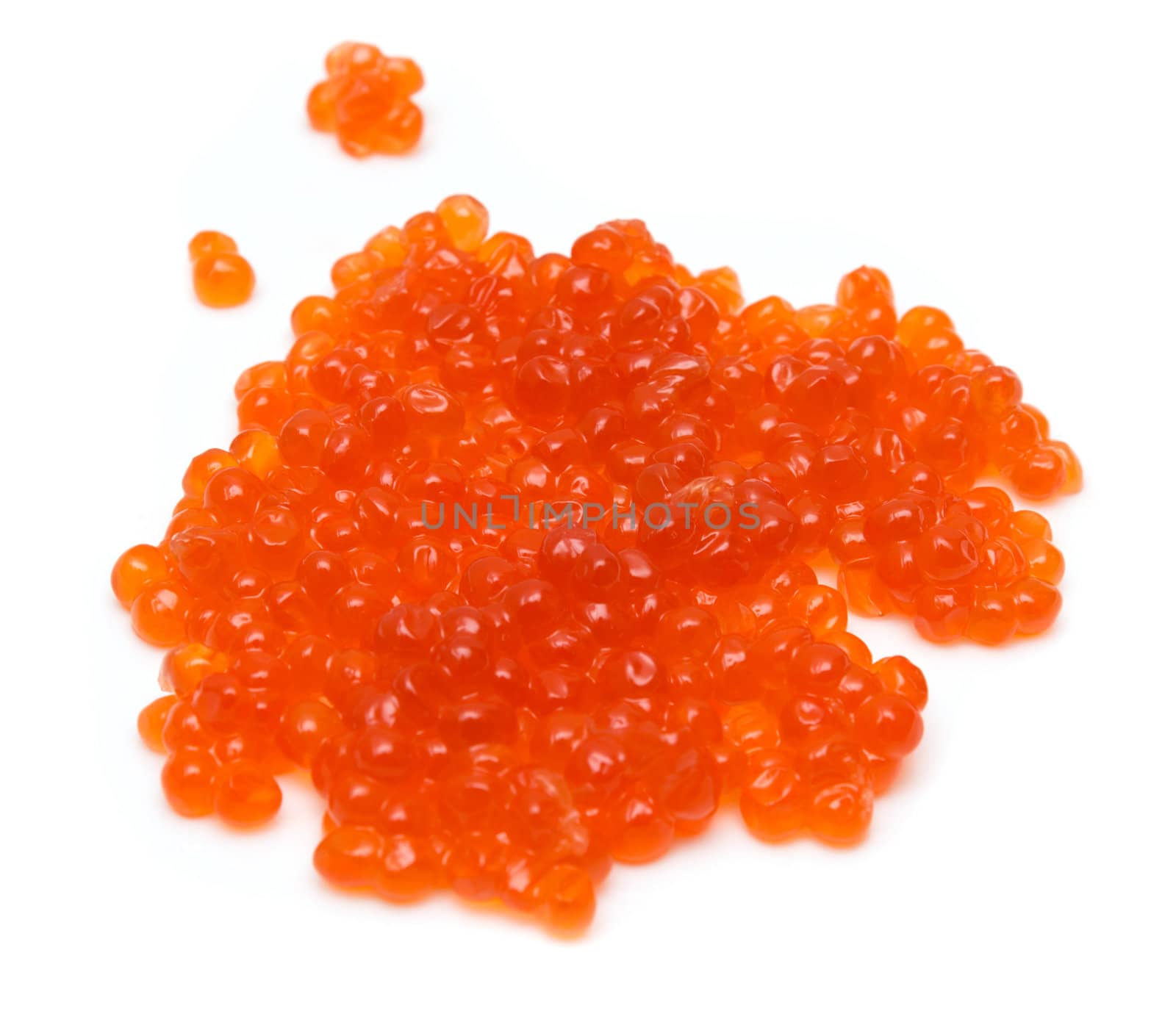 Red salmon caviar heap isolated on white 